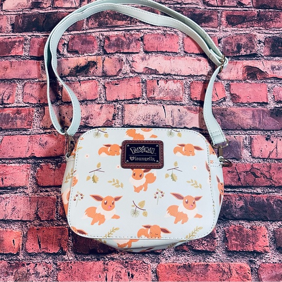 Loungefly Pokemon Eevee Pokemon Floral Heart Logo Crossbody Removable Strap RARE - Picture 1 of 11